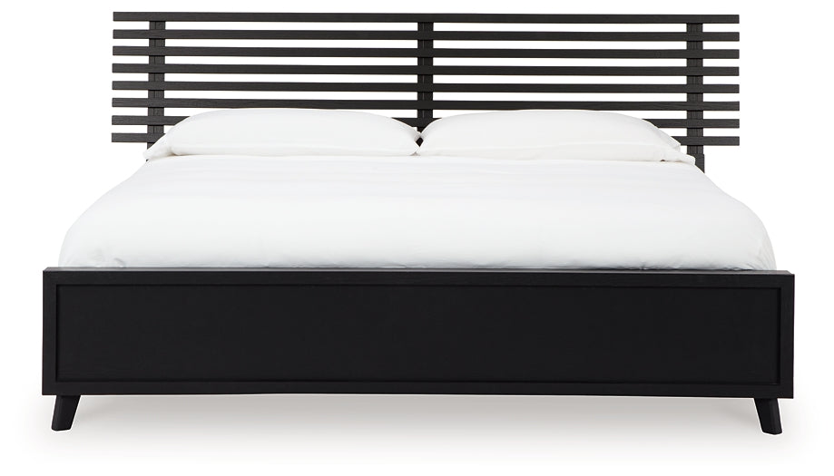 Danziar King Panel Bed with Mirrored Dresser and Nightstand