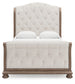 Ardenfield Queen Upholstered Sleigh Bed with Mirrored Dresser and Nightstand